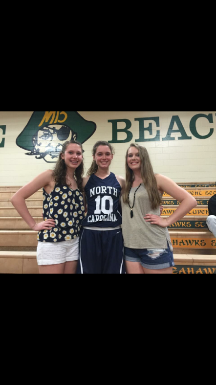 Bailey and her sisters, Reagan (left) and Campbell (right) after the game