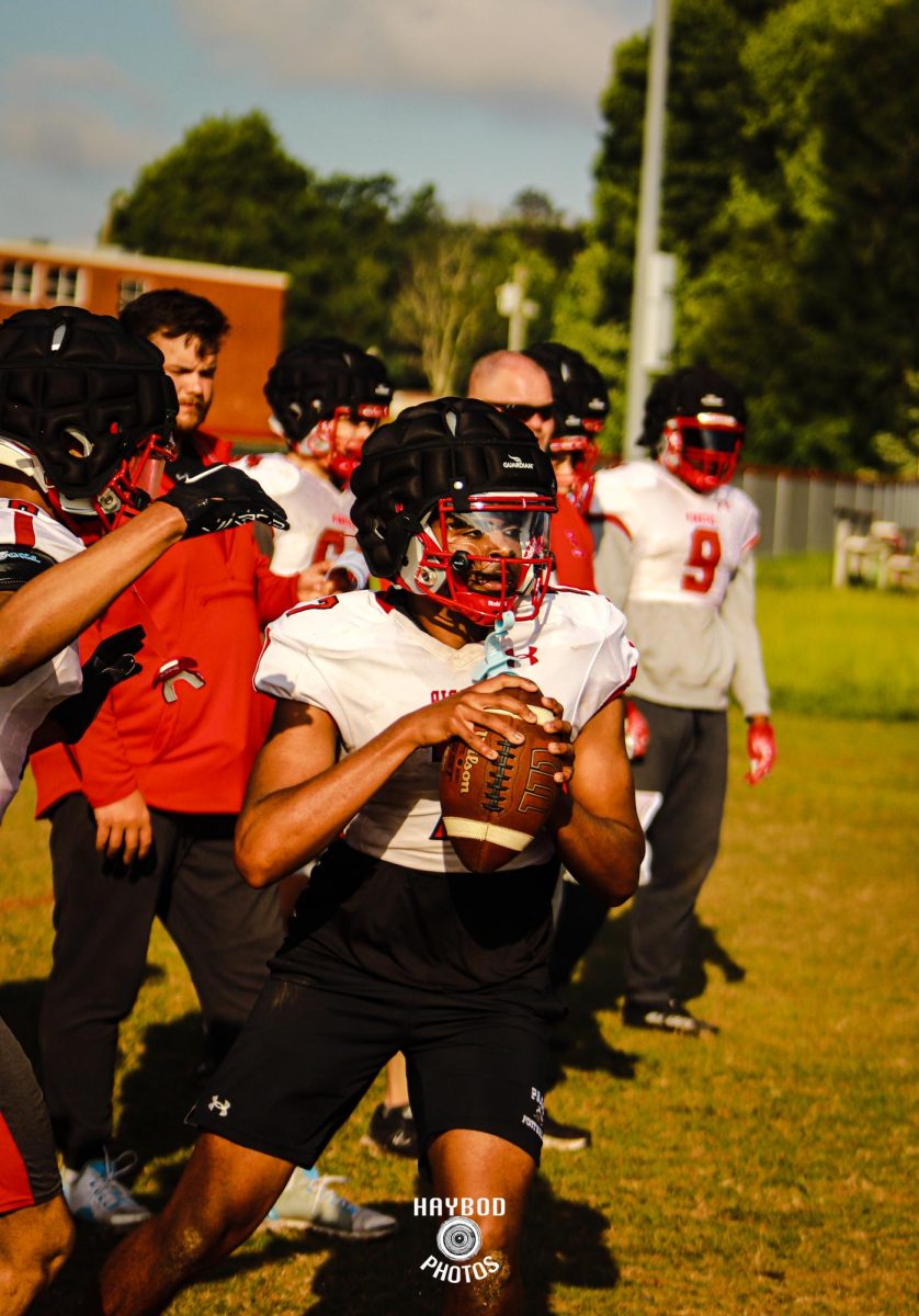 Page Kicks Off Spring Football Practices